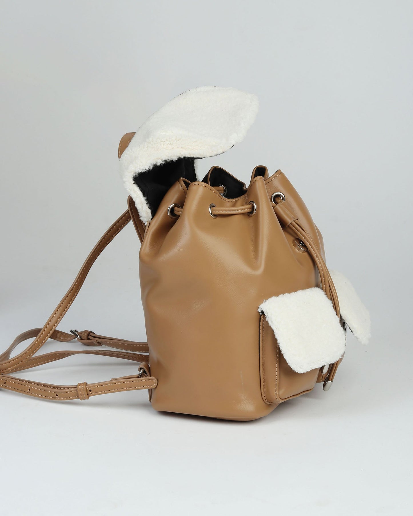 Faux shearling and leather backpack