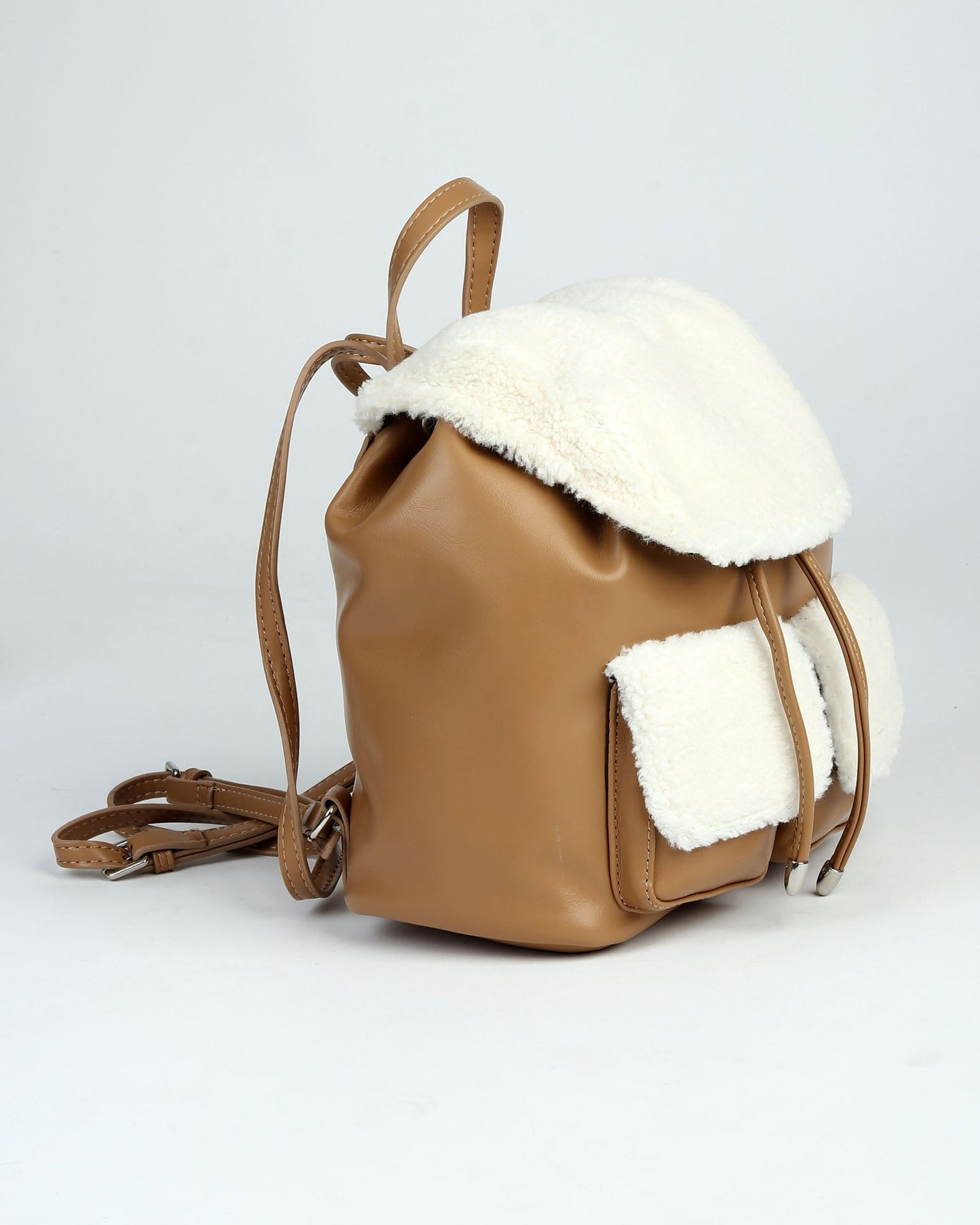 Faux shearling and leather backpack